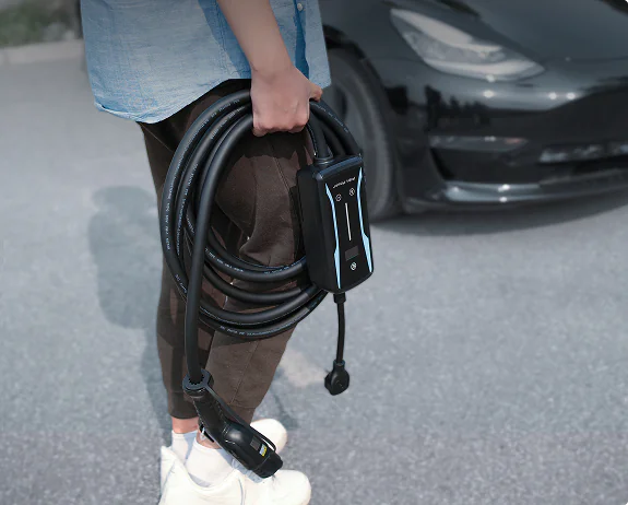 Lightweight Pion Power Flex-AC LE portable EV charger weighing only 5.9kg, designed for easy transport and travel-friendly charging.