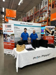 Pion Power team at Home Depot Roadshow 2024, showcasing EV chargers and portable power solutions